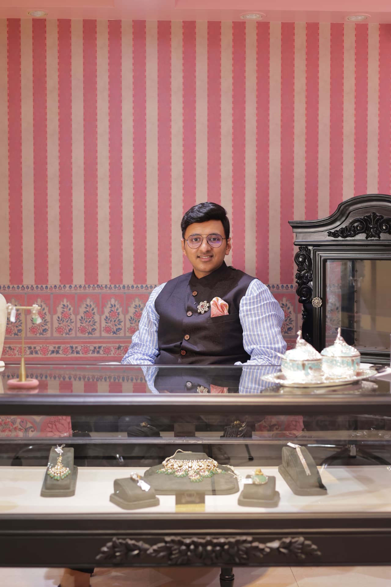 The fifth generation of the family at the jewellery counter in the Agra atelier