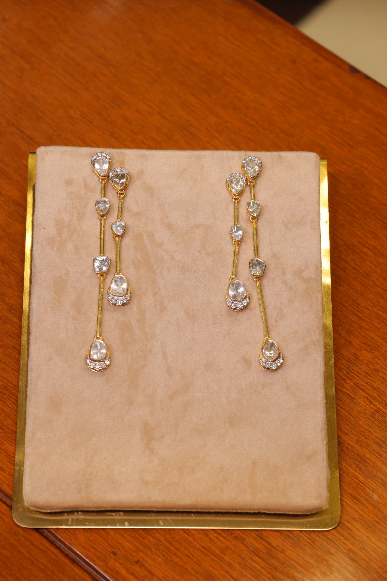Polki chandelier earrings, drawn and set to order in the atelier.